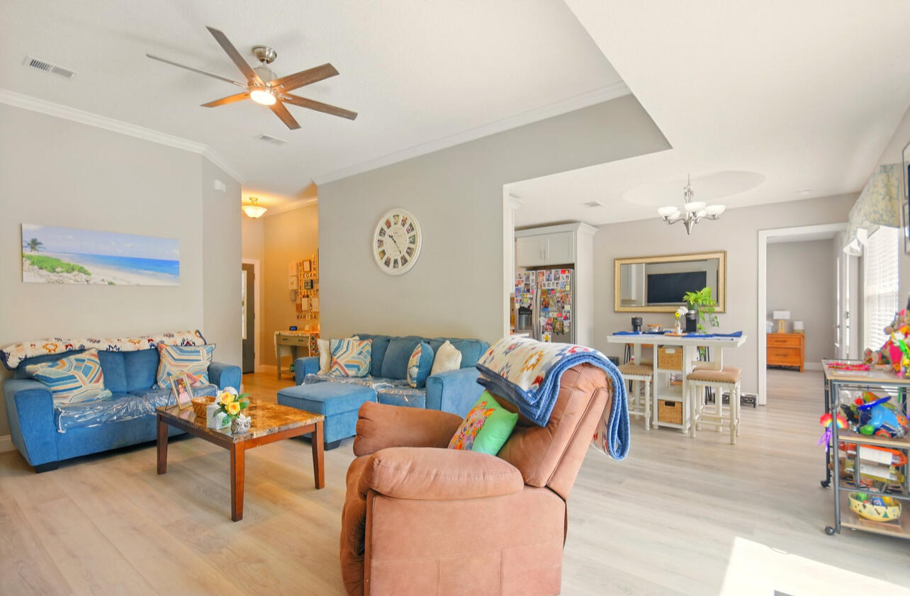 6474 Moonlight Lane Crestview, FL 32539 - Photo 36 of 39 a living room with furniture and wooden floor