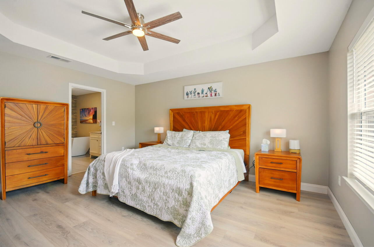 6474 Moonlight Lane Crestview, FL 32539 - Photo 9 of 39 a bedroom with a bed and a dresser