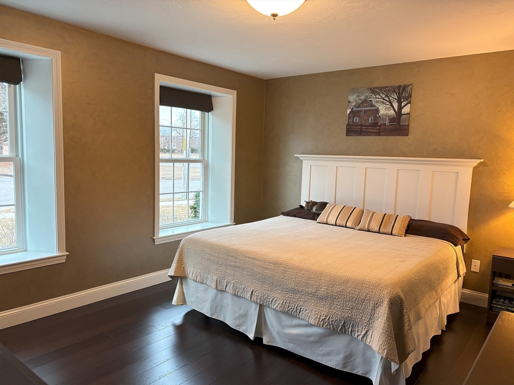 14 Cavite Street Devens, MA 01434 - Photo 20 of 40 a bedroom with a bed and wooden floor