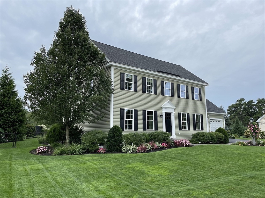 14 Cavite Street Devens, MA 01434 - Photo 2 of 40 a front view of a house with a yard