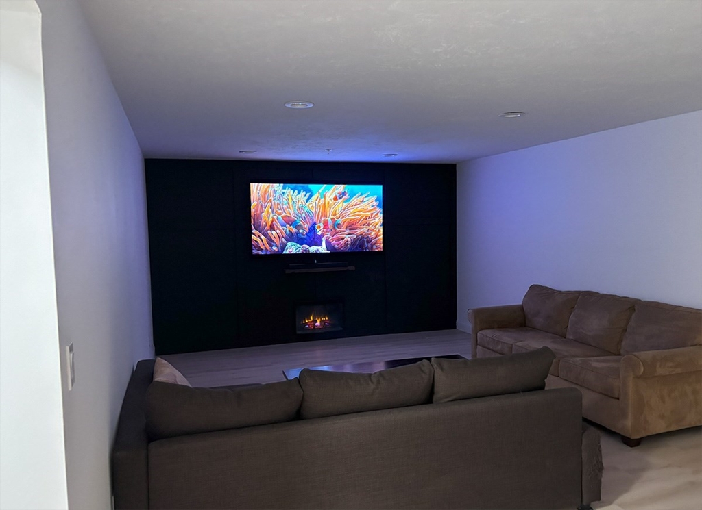 14 Cavite Street Devens, MA 01434 - Photo 27 of 40 a living room with furniture and a flat screen tv