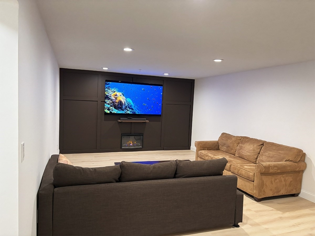 14 Cavite Street Devens, MA 01434 - Photo 28 of 40 a living room with furniture and a flat screen tv