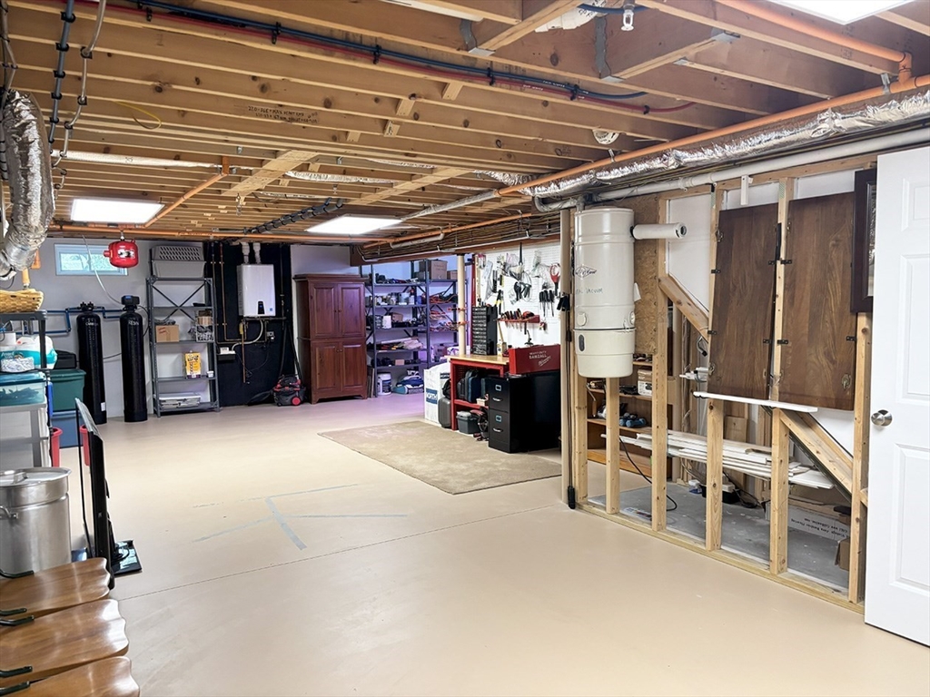 14 Cavite Street Devens, MA 01434 - Photo 31 of 40 a view of a room with wooden shelves