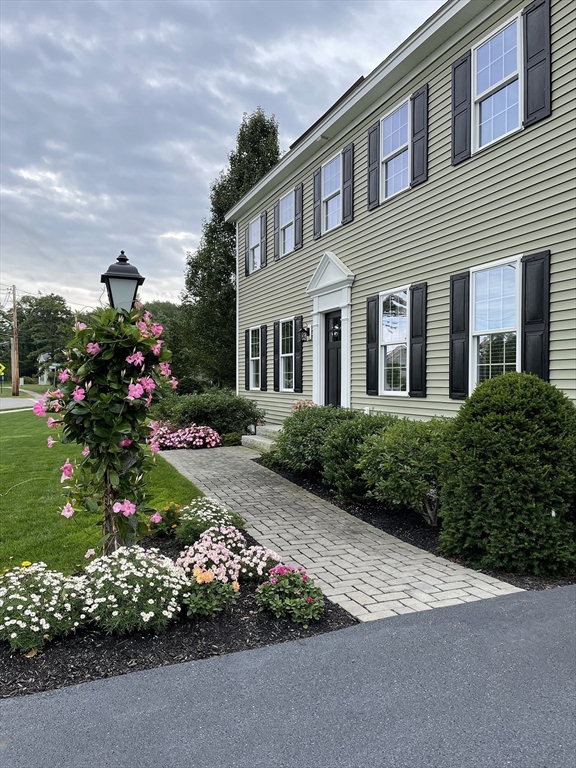 14 Cavite Street Devens, MA 01434 - Photo 7 of 40 a front view of a house with a yard