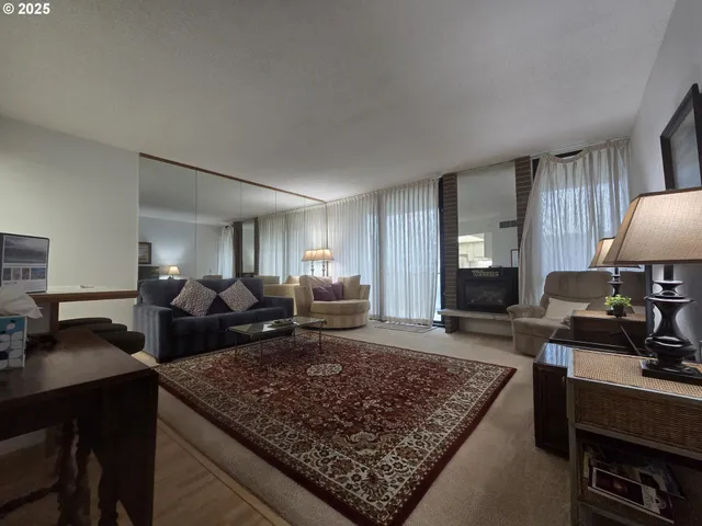 a living room with furniture and a couch