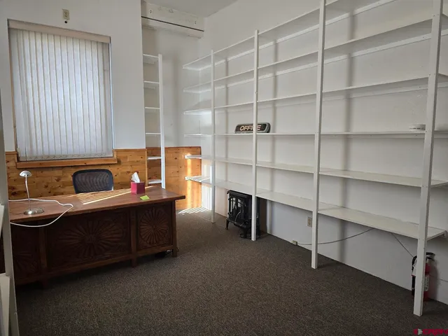 a room with cabinets and furniture