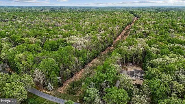 a view of a yard with an outdoor space
