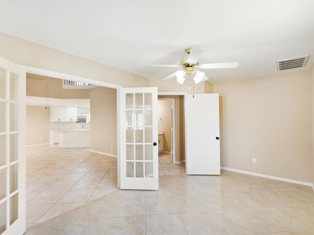 720 Pheasant Road Saginaw, TX 76131 - Photo 18 of 40 a view of an empty room with a window