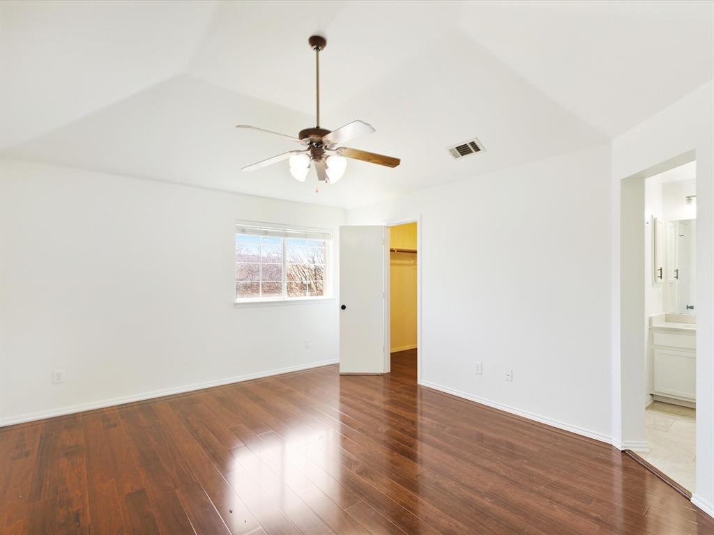 720 Pheasant Road Saginaw, TX 76131 - Photo 24 of 40 a view of empty room with wooden floor