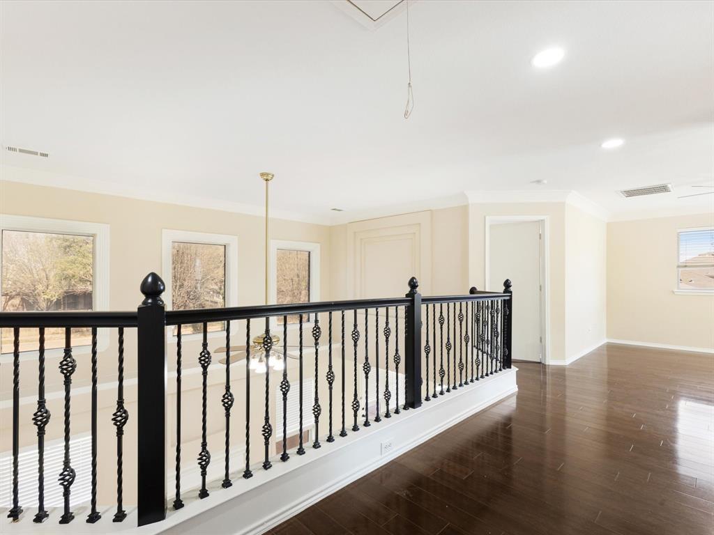 720 Pheasant Road Saginaw, TX 76131 - Photo 29 of 40 a view of hallway with wooden floor