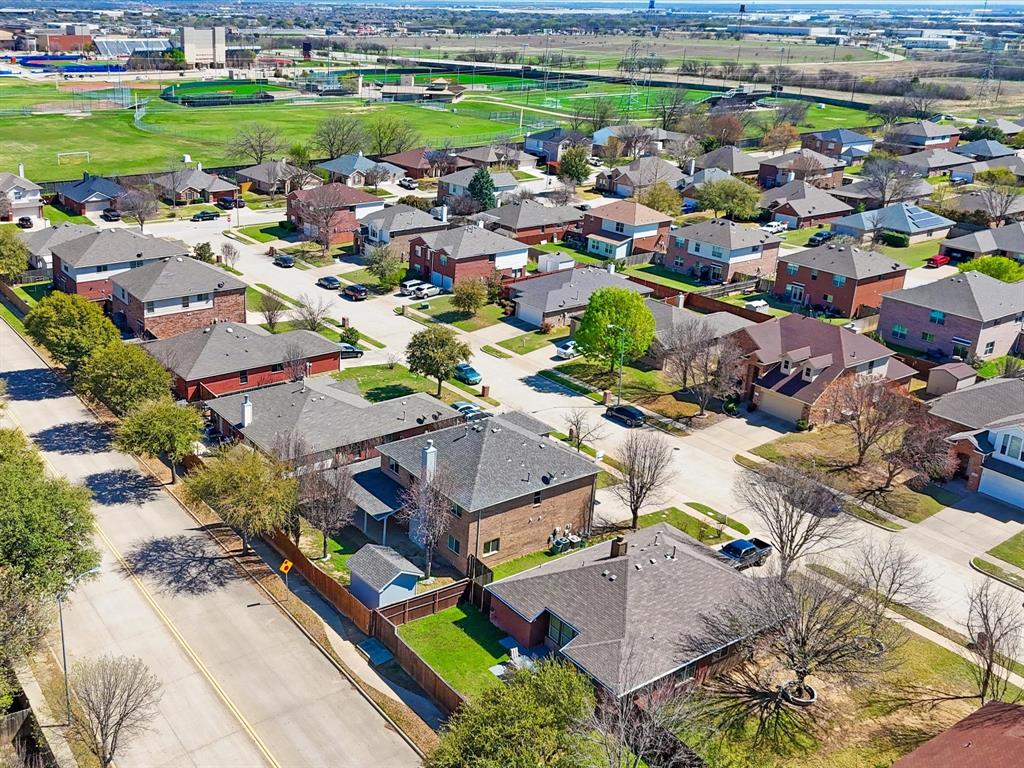 720 Pheasant Road Saginaw, TX 76131 - Photo 32 of 40 an aerial view of a house with a garden