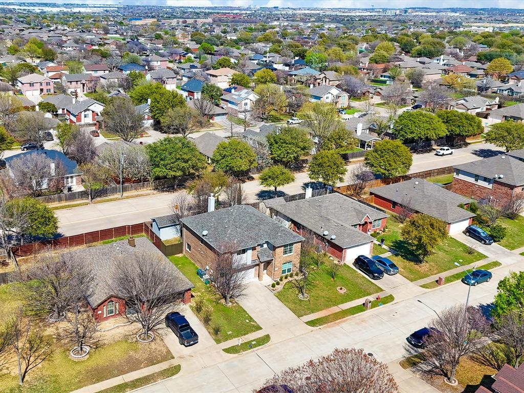 720 Pheasant Road Saginaw, TX 76131 - Photo 33 of 40 an aerial view of a residential houses with outdoor space