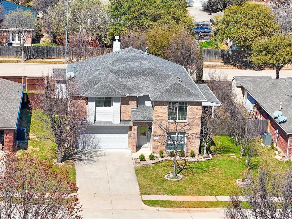 720 Pheasant Road Saginaw, TX 76131 - Photo 35 of 40 a view of a house with pool