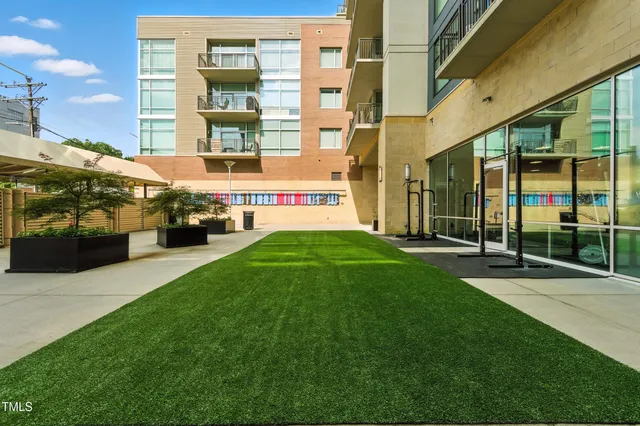 a view of building with yard