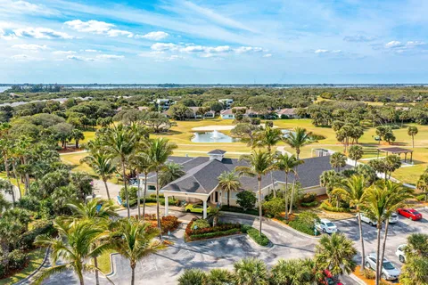 an aerial view of residential building with ocean view