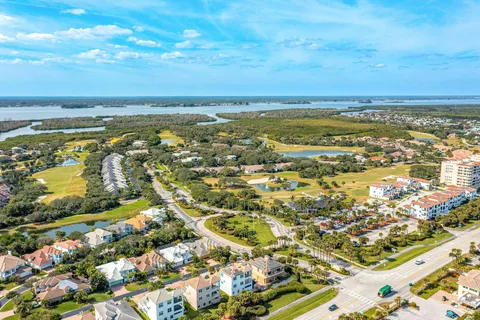 an aerial view of a house with a garden