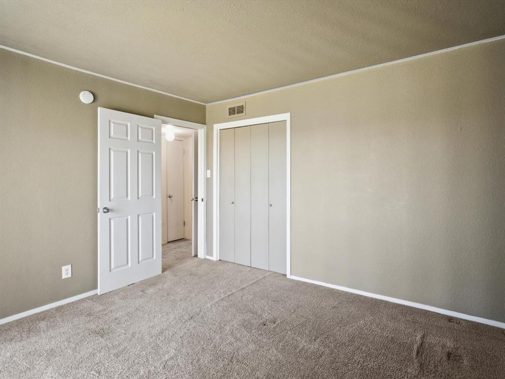 102 Harbor Drive, Unit 204 Runaway Bay, TX 76426 - Photo 12 of 17 a view of an empty room