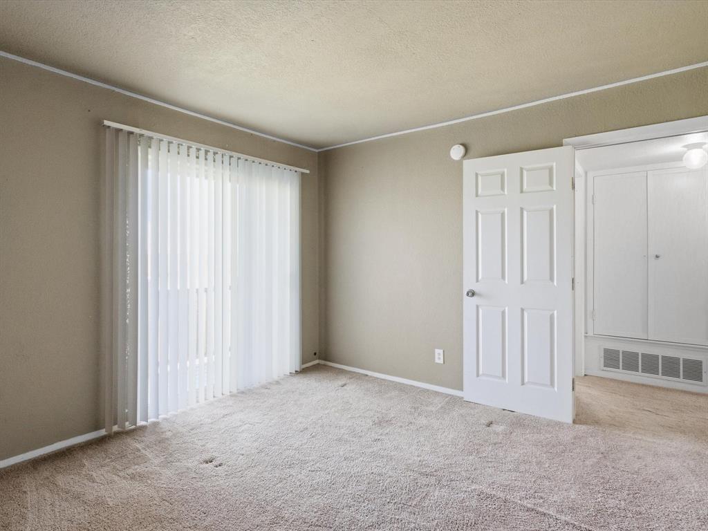 102 Harbor Drive, Unit 204 Runaway Bay, TX 76426 - Photo 13 of 17 a view of an empty room