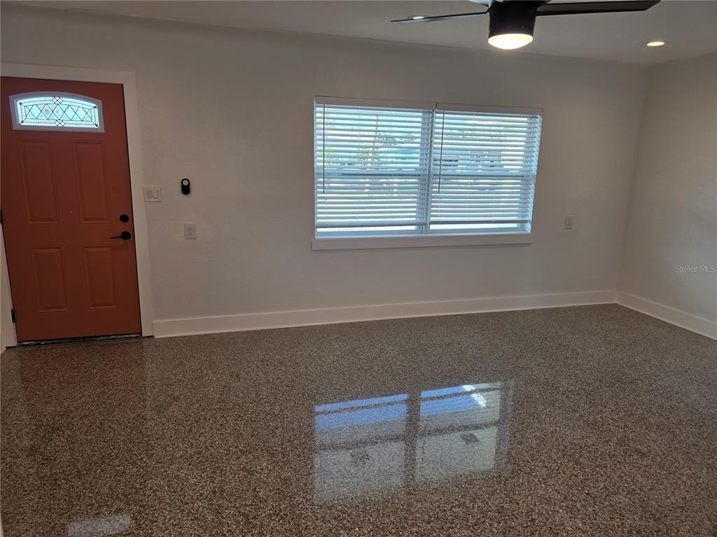 430 80th Way St. Pete Beach, FL 33706 - Photo 15 of 42 an empty room with windows