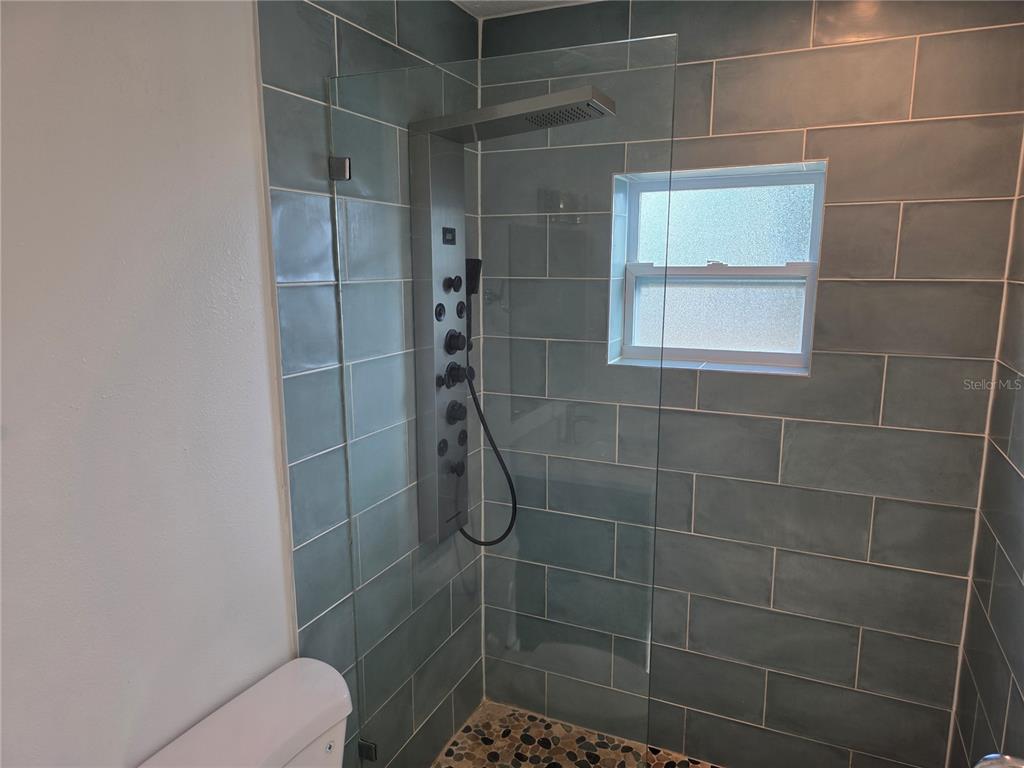 430 80th Way St. Pete Beach, FL 33706 - Photo 29 of 42 a bathroom with a toilet