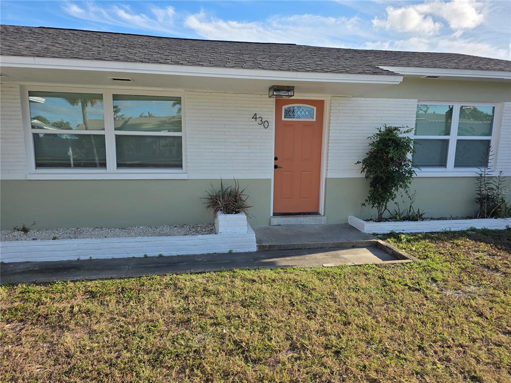 430 80th Way St. Pete Beach, FL 33706 - Photo 5 of 42 a view of a entryway front of house