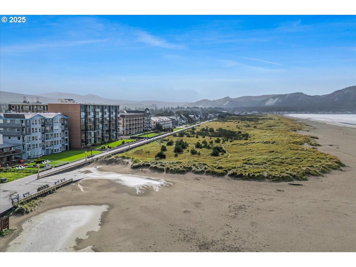 361 South Promenade, Unit 502 Seaside, OR 97138 - Photo 44 of 46 a view of a terrace with a yard