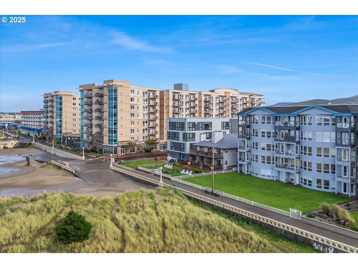 361 South Promenade, Unit 502 Seaside, OR 97138 - Photo 45 of 46 a view of a city with tall buildings