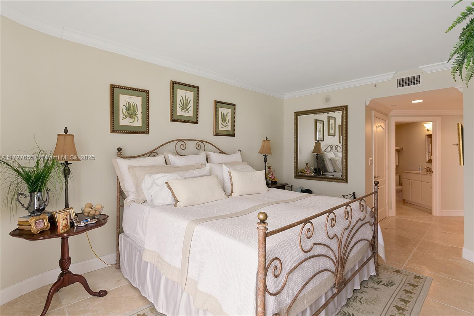 6365 Collins Avenue, Unit 3401 Miami Beach, FL 33141 - Photo 12 of 20 a bed room with a bed and a chair