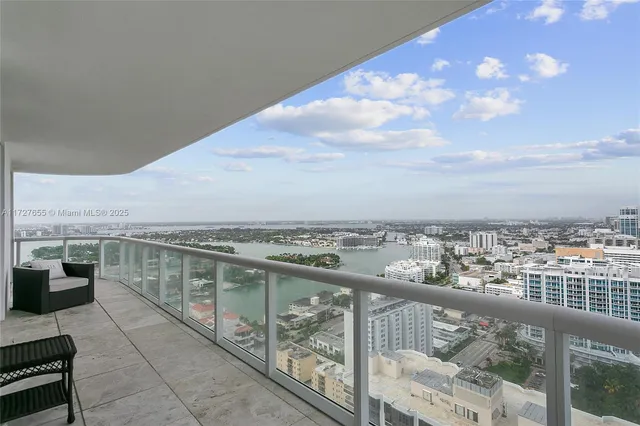 a view of roof with city view