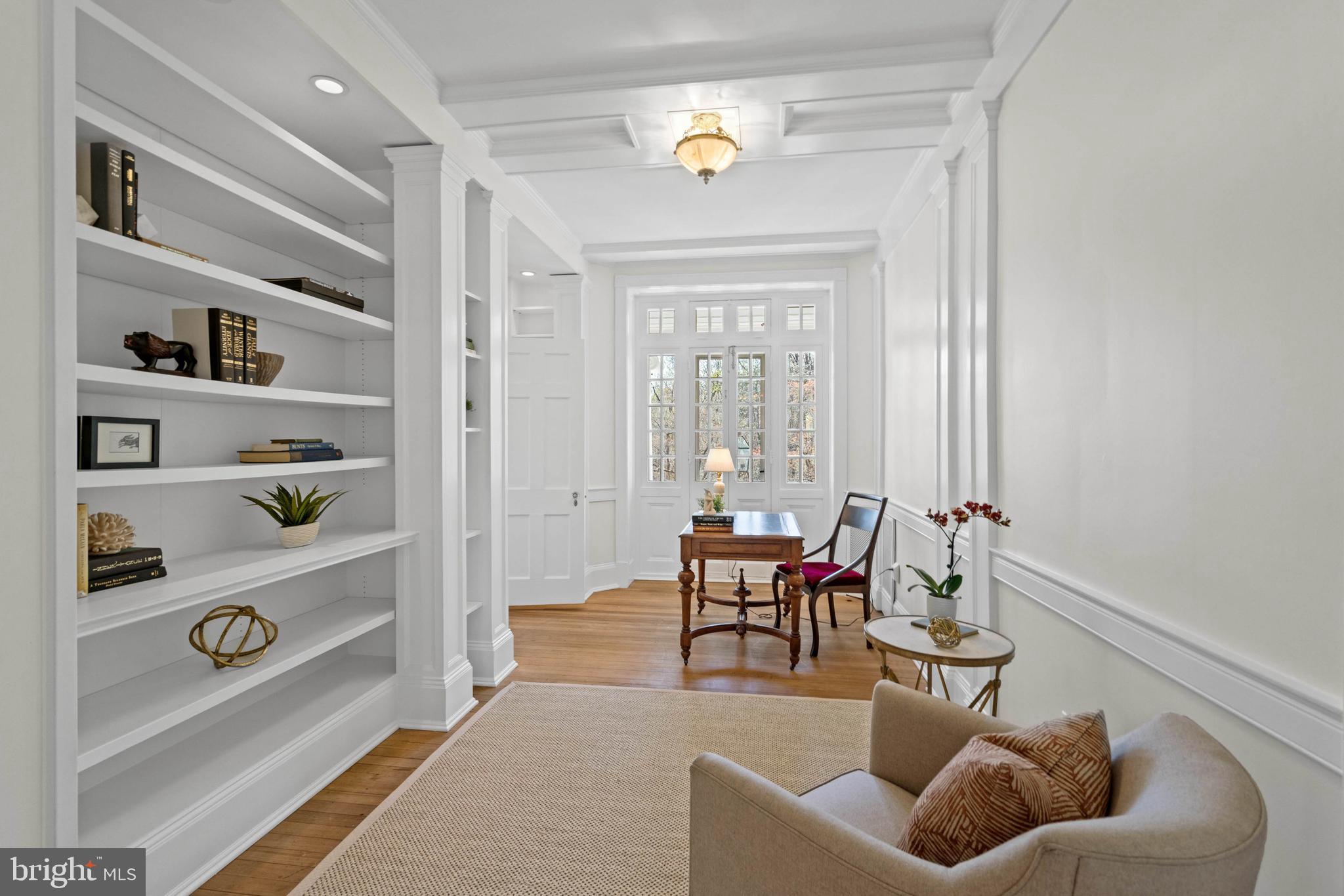 2325 Porter Street Northwest Washington, DC 20008 - Photo 25 of 50 a living room with furniture cabinets and a window