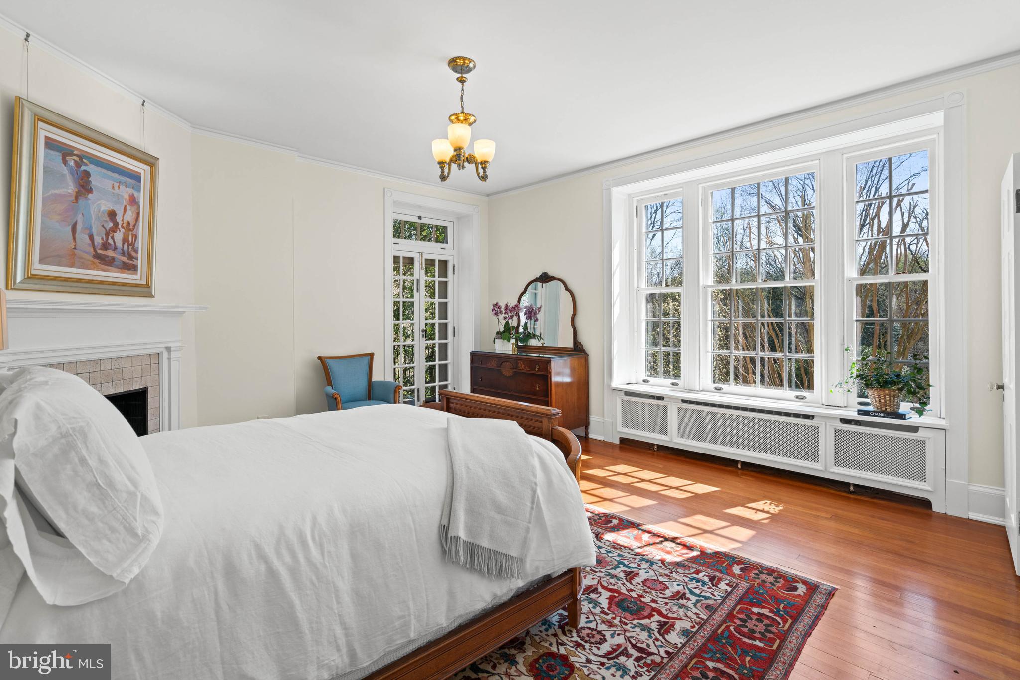 2325 Porter Street Northwest Washington, DC 20008 - Photo 26 of 50 a bed sitting in a spacious bedroom next to a window