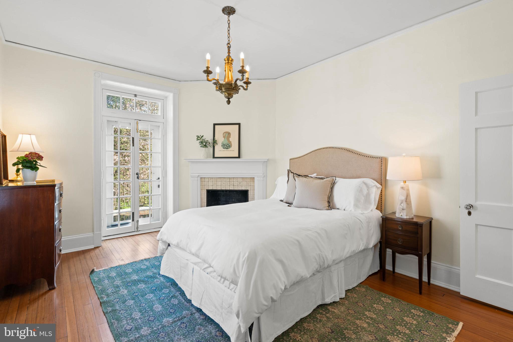 2325 Porter Street Northwest Washington, DC 20008 - Photo 28 of 50 a bedroom with a large bed and a window