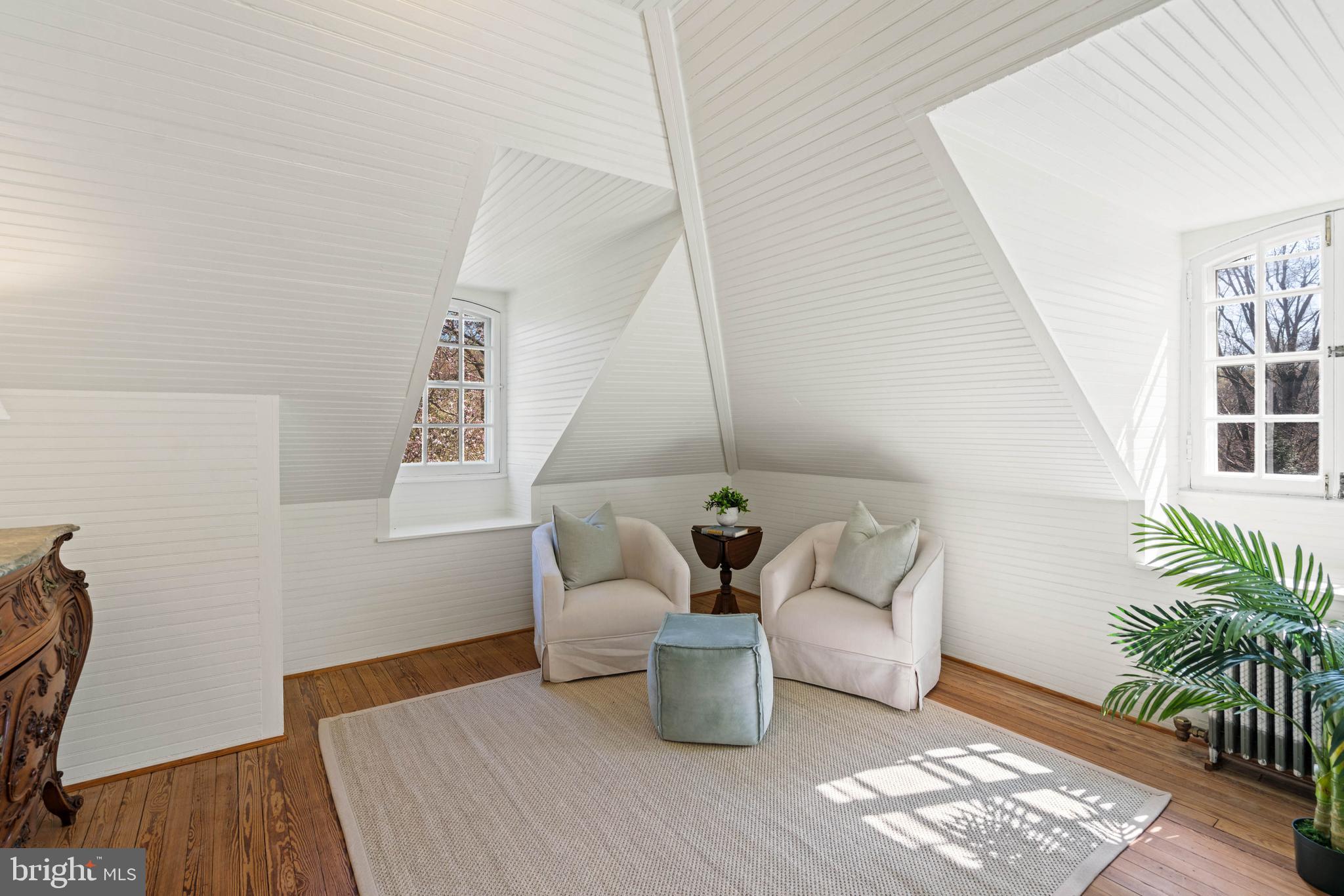 2325 Porter Street Northwest Washington, DC 20008 - Photo 32 of 50 a living room with furniture and wooden floor