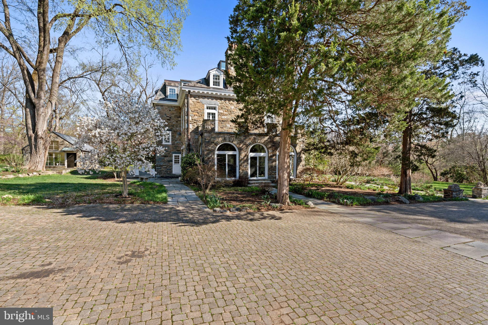 2325 Porter Street Northwest Washington, DC 20008 - Photo 41 of 50 a front view of a house with a yard