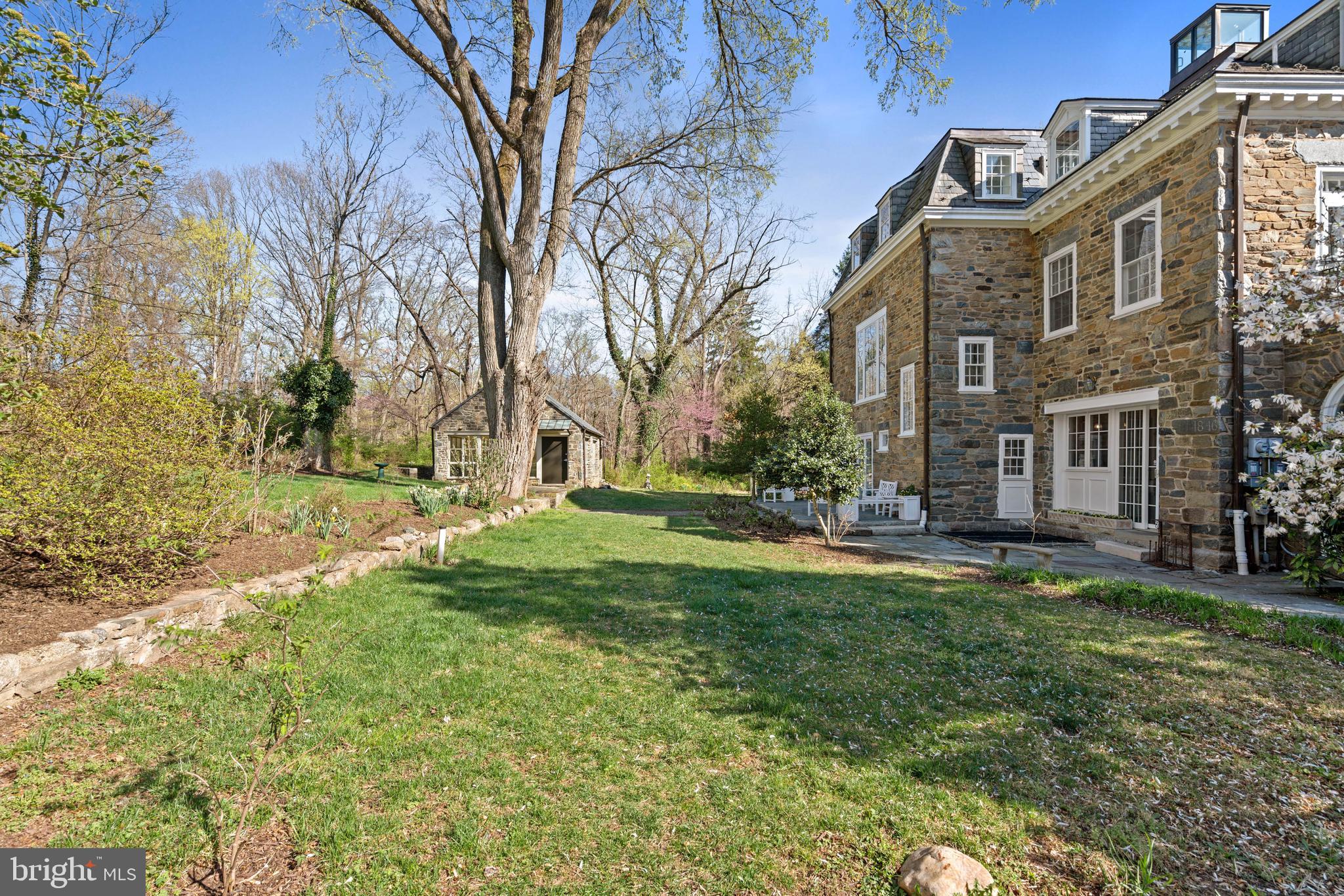 2325 Porter Street Northwest Washington, DC 20008 - Photo 42 of 50 front view of a house with a yard