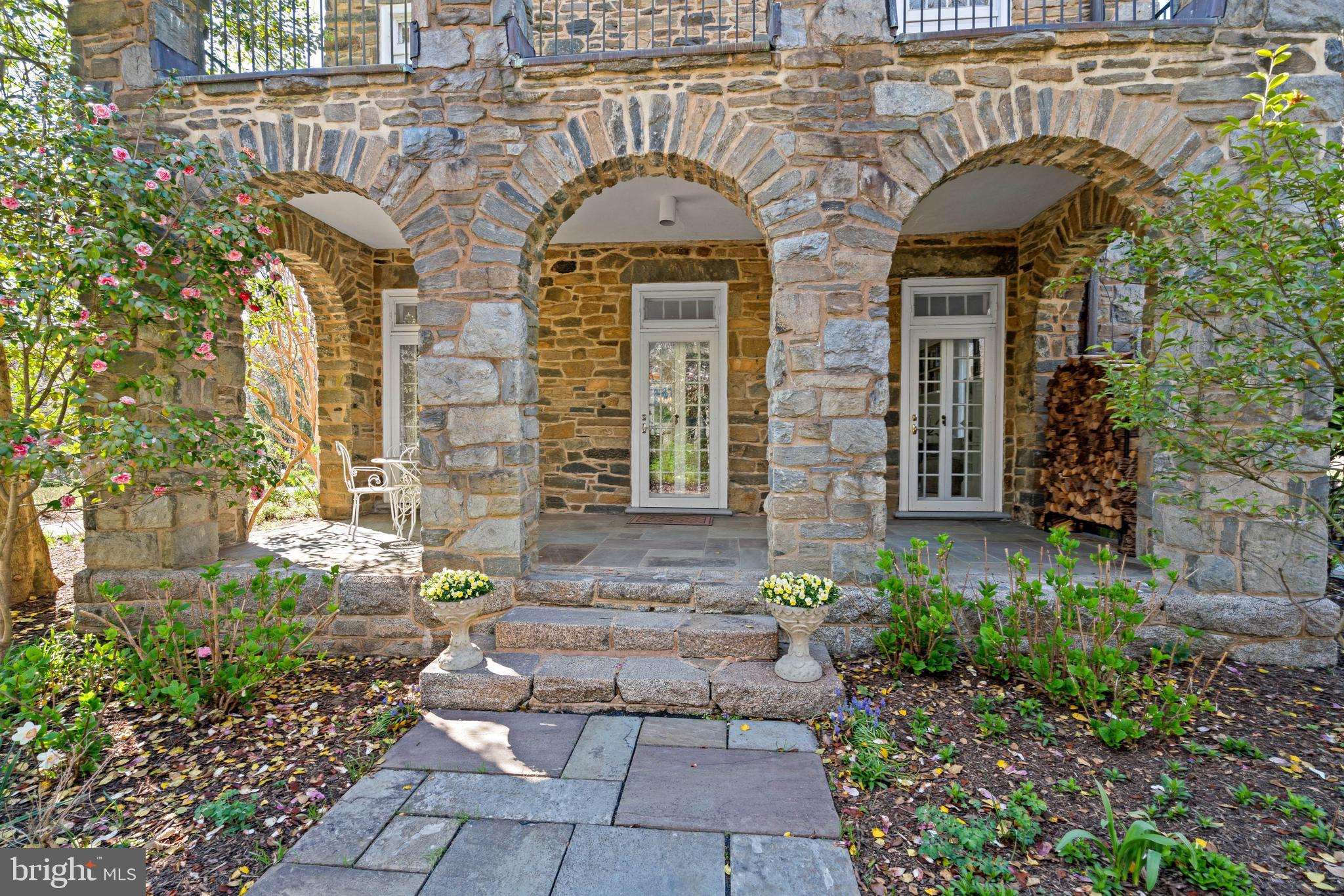 2325 Porter Street Northwest Washington, DC 20008 - Photo 45 of 50 a front view of a house with a garden