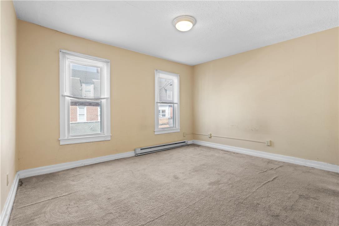 431 Pierce Street Bethlehem, PA 18015 - Photo 13 of 27 Well-lit room with ample space for relaxation or personalization.