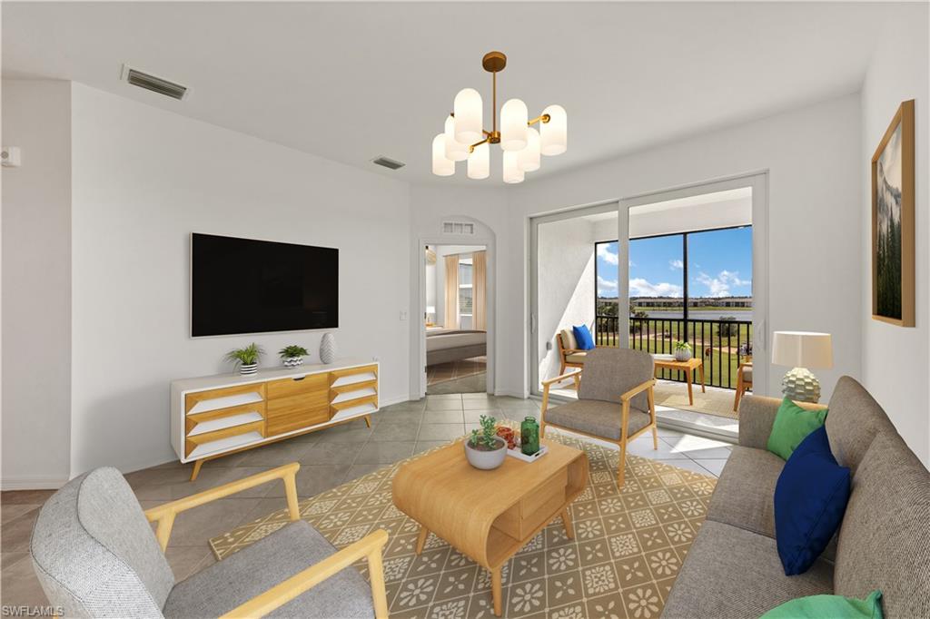 43997 Boardwalk Loop, Unit 1838 Punta Gorda, FL 33982 - Photo 2 of 45 a living room with furniture and a flat screen tv