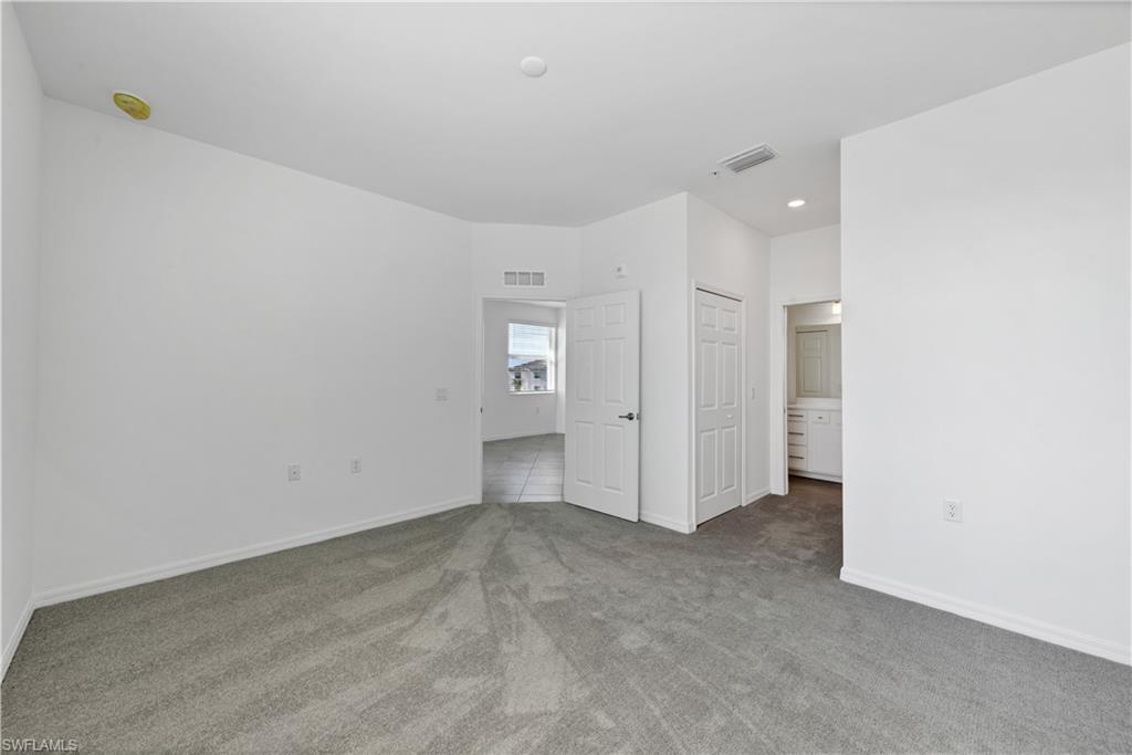 43997 Boardwalk Loop, Unit 1838 Punta Gorda, FL 33982 - Photo 24 of 45 an empty room with a bathroom