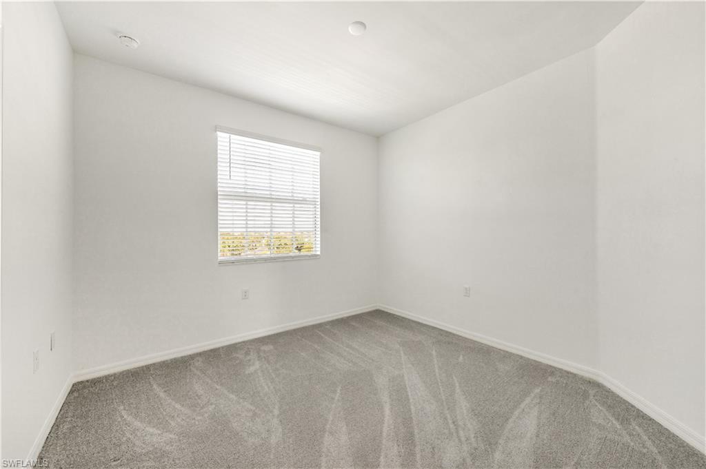 43997 Boardwalk Loop, Unit 1838 Punta Gorda, FL 33982 - Photo 35 of 45 an empty room with a window