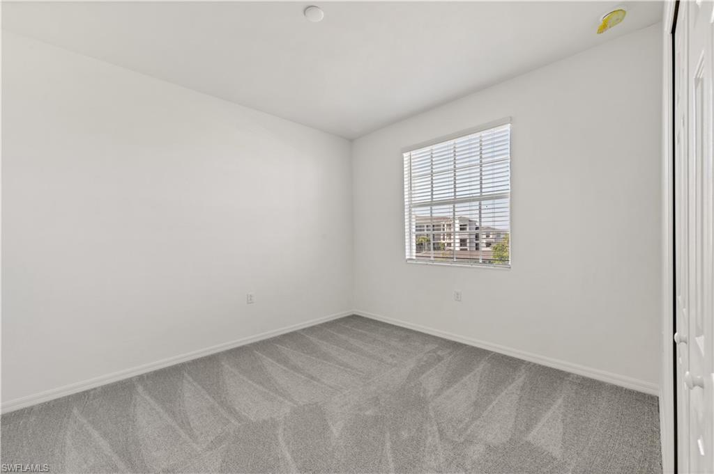 43997 Boardwalk Loop, Unit 1838 Punta Gorda, FL 33982 - Photo 36 of 45 an empty room with a window