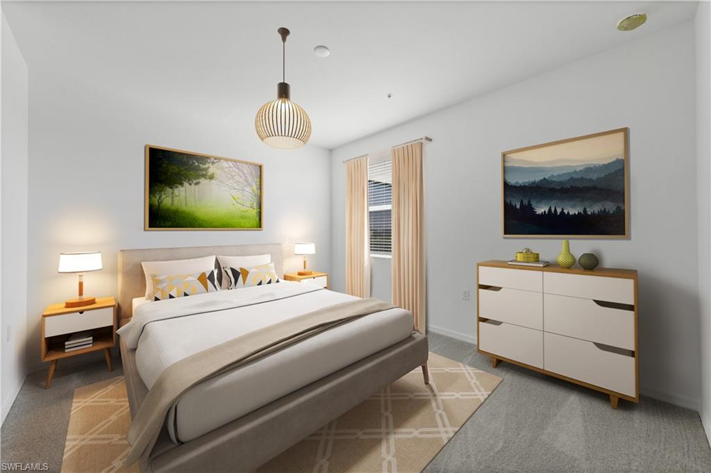 43997 Boardwalk Loop, Unit 1838 Punta Gorda, FL 33982 - Photo 5 of 45 a bedroom with a bed and a flat screen tv