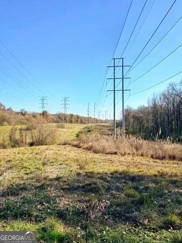 a view of a yard with an ocean