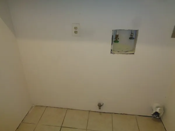 a view of a room with an empty space