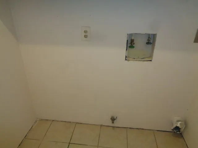 a view of a room with an empty space