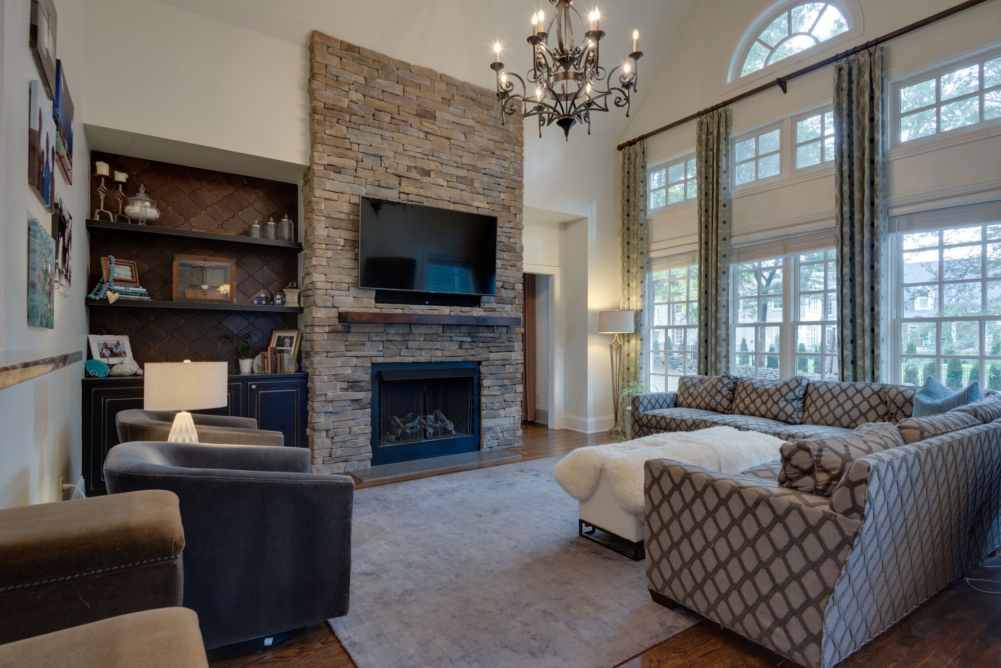 1432 Willowbrooke Circle Franklin, TN 37069 - Photo 13 of 41 a living room with furniture a flat screen tv and a fireplace