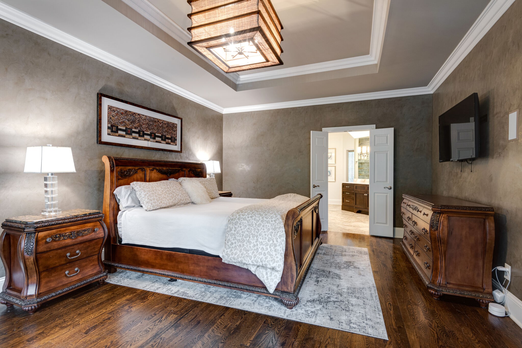 1432 Willowbrooke Circle Franklin, TN 37069 - Photo 18 of 41 a bedroom with a bed and a television on the dresser