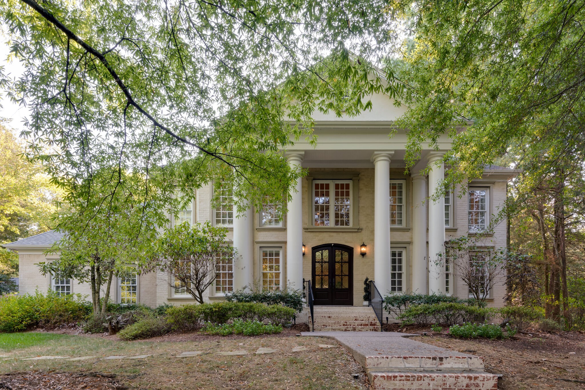 1432 Willowbrooke Circle Franklin, TN 37069 - Photo 2 of 41 a front view of a house with garden