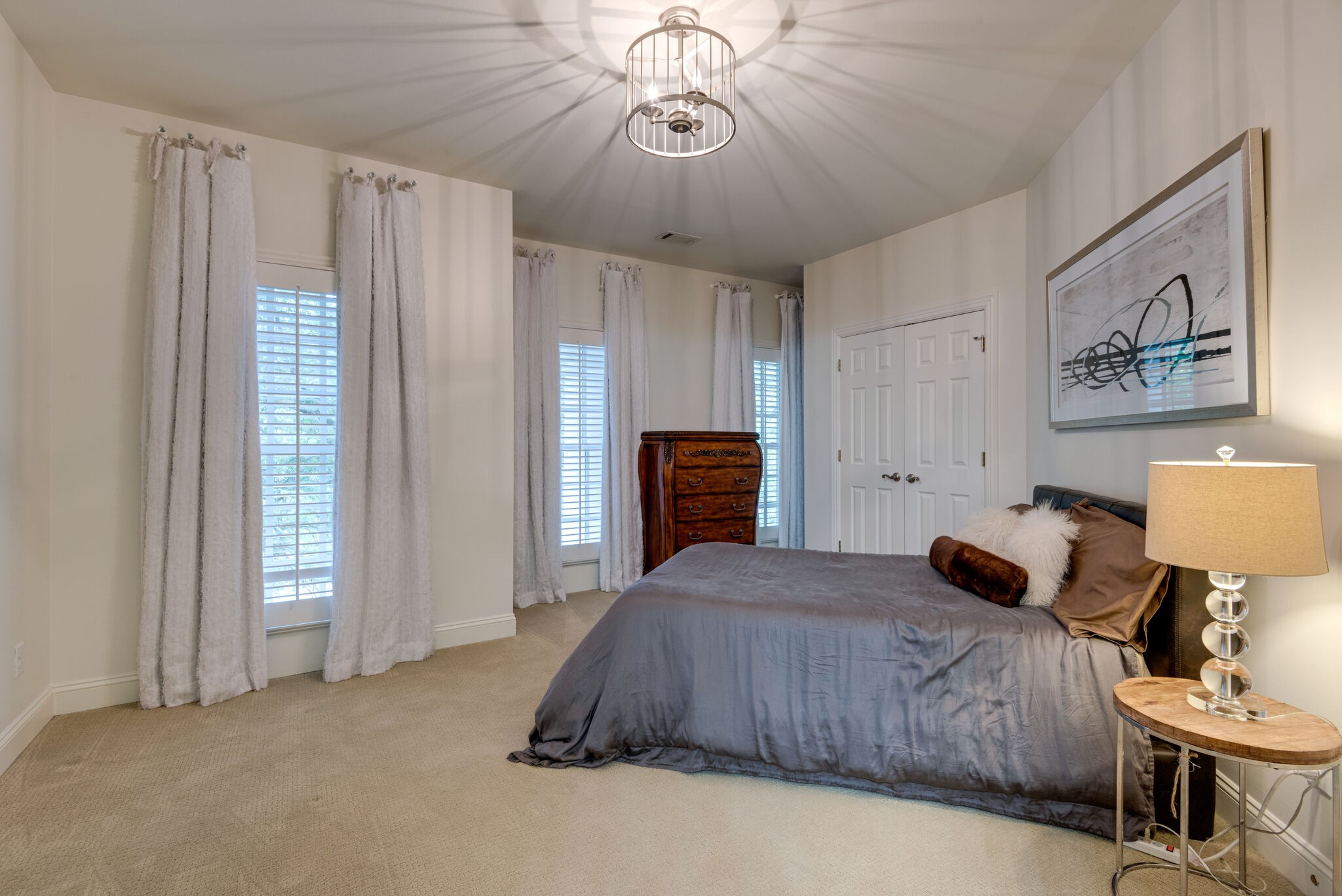 1432 Willowbrooke Circle Franklin, TN 37069 - Photo 28 of 41 a bedroom with a bed and a chandelier