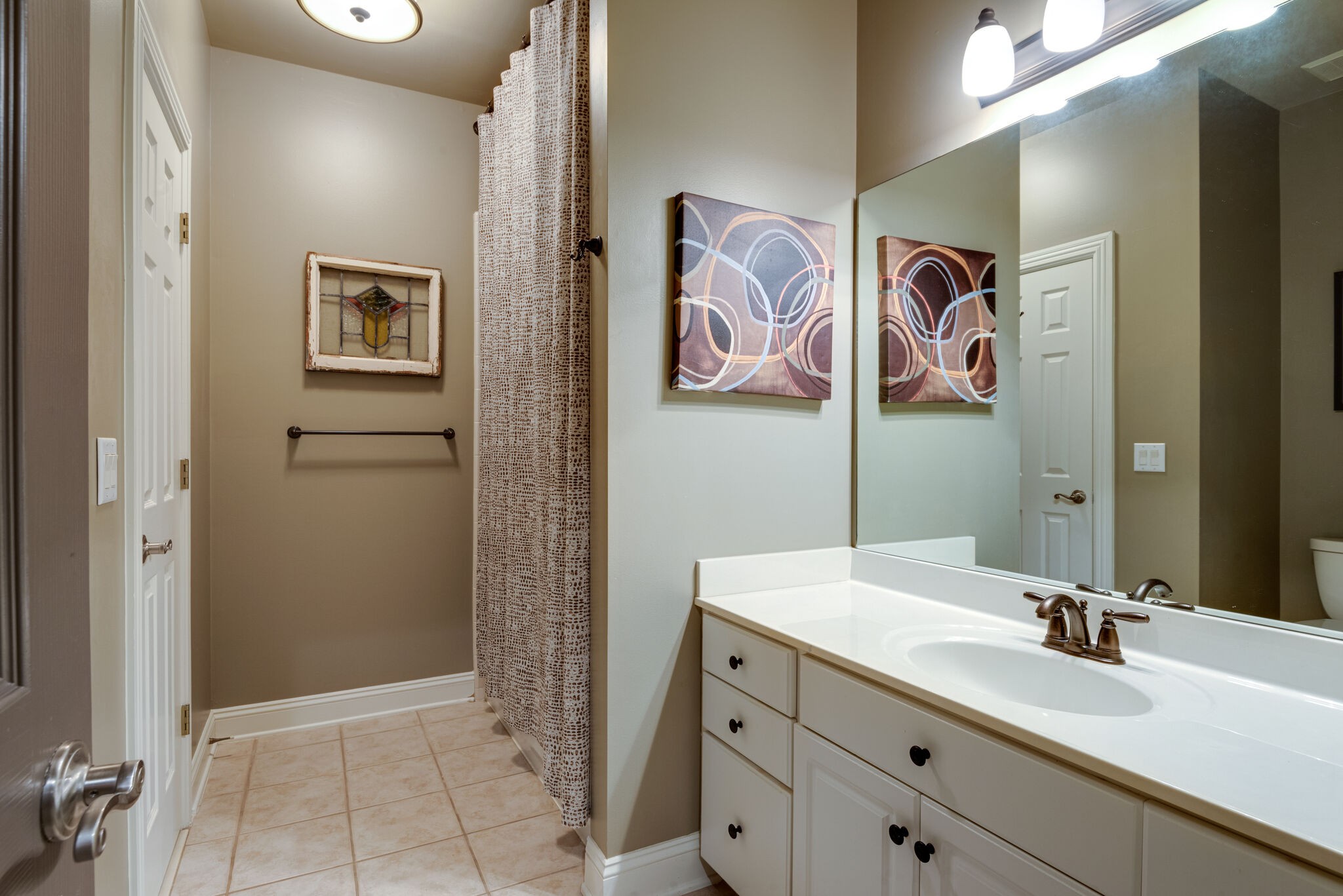 1432 Willowbrooke Circle Franklin, TN 37069 - Photo 33 of 41 a bathroom with a sink and mirror